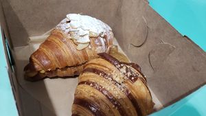 Almond croissant, hazelnut croissant ($10 each) at L'Artisane Bakery  in Miami