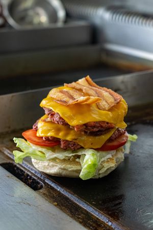 Il Doppio: double burger, double bacon,
double cheddar, salad,
tomato, mayo at Arrecrià Bistrot in Naples