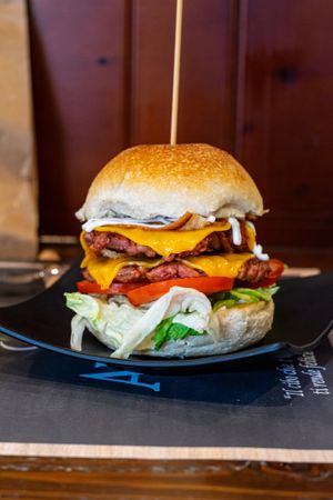 Il Doppio: double burger, double bacon,
double cheddar, salad,
tomato, mayo at Arrecrià Bistrot in Naples