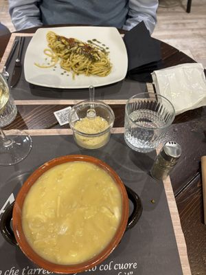 Pasta patate e provola e spaghetti al sapore di mare  at Arrecrià Bistrot in Naples