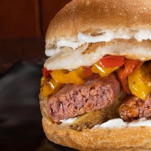 Calabrese: roasted peppers, melted provola cheese, sausage, homemade garlic mayonnaise, and baked potatoes at Arrecrià Bistrot in Naples