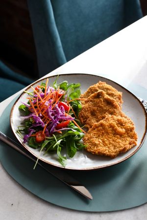 Milanesas de Girgola ~ rebozadas en panko con guarnicion de ensalada. at Nicolita Cocina Veggie in Buenos Aires