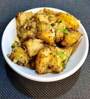 Herb roasted potatoes  at Food Souk Restaurant in Dubai