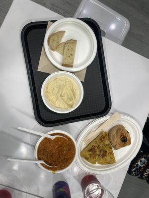 Bread, hummus, borlotti pancetta e paprika, tortilla, pizza roll  at La Radice in Udine