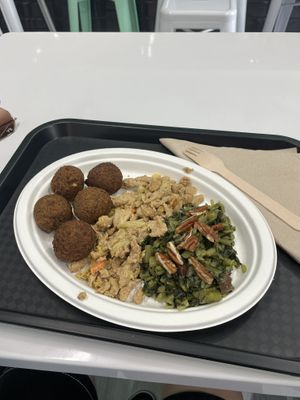 Falafel, pea protein with miso and vegetables, chicoree with olives and pecan nuts  at La Radice in Udine