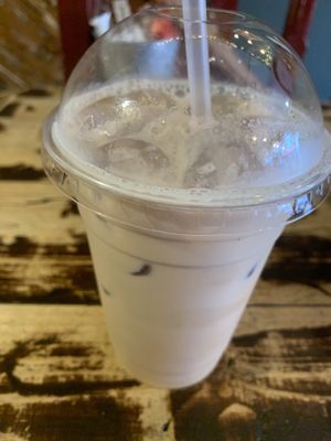 Iced oat milk latte with caramel syrup  at Java Coffee Shop in Keswick