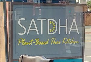 Street Sign you can't miss at Satdha Plant Based Thai Kitchen in Santa Monica