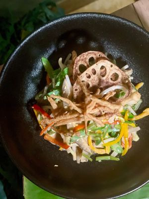 Valentines Menu 2024. Yum Tawai. A Royal Thai Salad featuring Seven vegetables, blanched in coconut milk, with a warm Tamarind curry dressing at Satdha Plant Based Thai Kitchen in Santa Monica