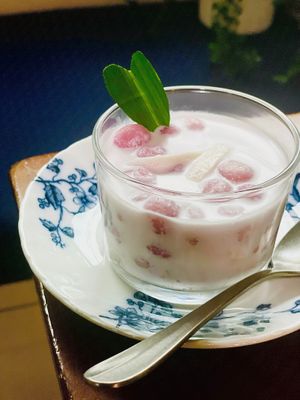 Valentine's Menu 2024. 
Bua Loy Phuak (floating lotus) – Taro/sticky rice pearls in sweet coconut cream with fresh young coconut at Satdha Plant Based Thai Kitchen in Santa Monica