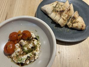 Ricotta de tofu, avellanas tostadas, aceite de hierbas y tomates cherries  at Domo in Barcelona