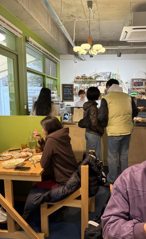 It was 10:30 AM. All the seats are reserved on the hall & other 3 tables were taken quickly by walk-in customers. Many people also came to buy breads as well.   at URT 유알티 in Seoul
