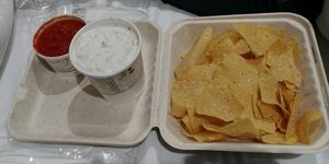 To go order of three layer bean dip with chips and salsa at Bueno Loco Restaurante in Falmouth