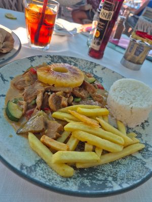 Vegan curry... Seitan in curry sauce with veg, chips and rice at Bahia Beach in Tenerife