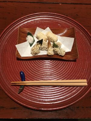 Tofu and various vegetables with popped rice and salt at Itosho in Tokyo