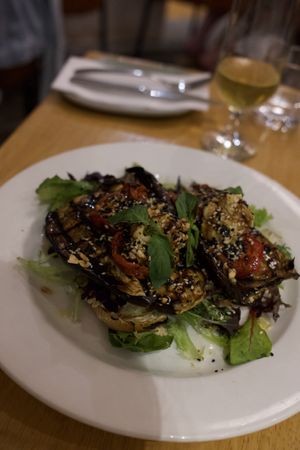 Vegan Bruschetta, hummus, 'nduja, chargrilled eggplant, oven-roasted tomatoes, rocket, chargrilled sourdough  at Maman in Burleigh Heads