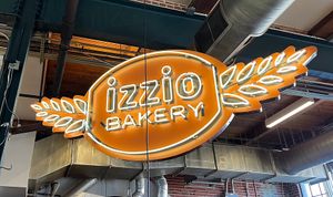 Sign  at Izzio Bakery and Cafe in Denver