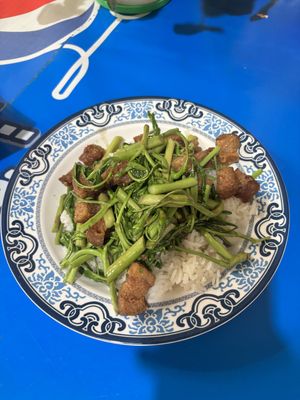 Pork belly and morning glory on rice  at Lee Jae Vegetarian Food in Bangkok