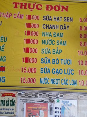 Menu on wall at Phước Thiện in Ho Chi Minh City