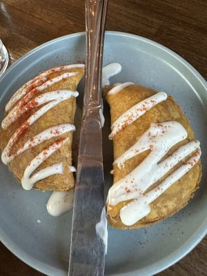 Samosas that were almost empanadas; spicy with a hint of sweet  at Norah - Alberta in Portland
