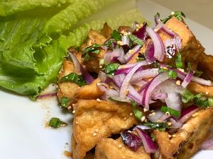 Larb Tofu: Red Onions, Cilantro, Mint, Chili Powder, Ground Roasted Rice, Lime Juice  at Thai Table in Grand Rapids