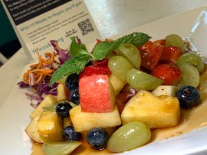 Thai Spicy Fruit Salad: Pineapple, Strawberries, Apples, Grapes, Blueberries in Thai Chili/Tamarind Sauce. (Grand Rapids Vegan Chef Challenge 9/25) at Thai Table in Grand Rapids