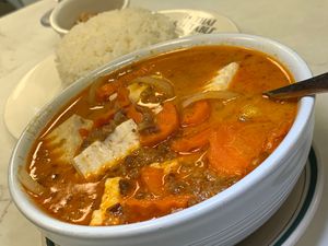 Massaman Curry: Onions, Potatoes, Carrots, Roasted Peanuts in House Peanut Curry, add Tofu at Thai Table in Grand Rapids