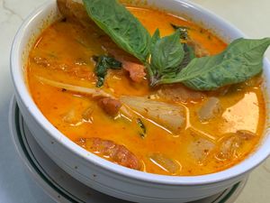 Pineapple Curry: Pineapple, Tofu, Bamboo Shoots, Carrots, Basil in Red Curry Coconut Sauce at Thai Table in Grand Rapids