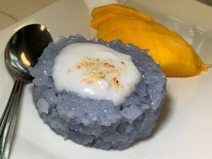 Mango & Sticky Rice with Butterfly Pea Flower & Coconut Milk at Thai Table in Grand Rapids