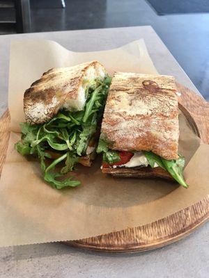 Caprese Sandwich | Cashew buffalo mozzarella, heirloom tomato, basil pesto on Ciabatta bread. at Ittle Litaly in Coral Gables