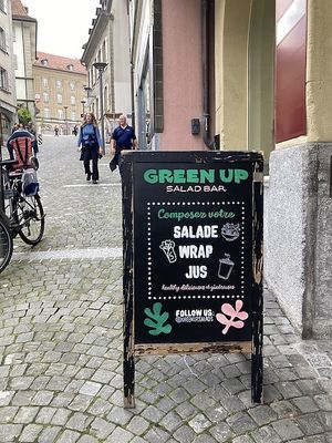 Street sandwich board at Green Up Salad Bar in Lausanne