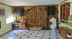 The altar room at Centro Cultural Hare Krishna in Malaga