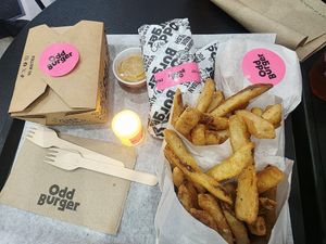 Tacos, fries, honey mustard & chick'un wings at Odd Burger - Church St in Toronto