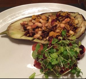 eggplant skin filled with polenta, nusts and raisins at Nico's in Inverness