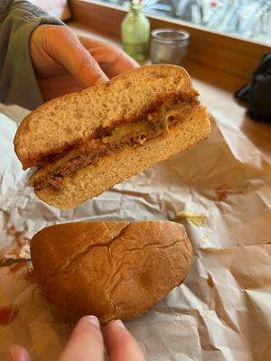 Green Smash (Bread Buns, Double “Beyond Meat” Steak, Double Cheddar, Red Onions, Lettuce, Pickles, Pink Sauce)  at Green Farmer's in Amsterdam