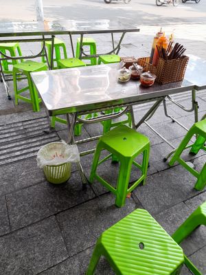 Dining area outside on the pavement at Quán Chay in Ho Chi Minh City