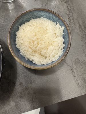 Steamed Rice with an entree   at Hakka Guelph in Guelph