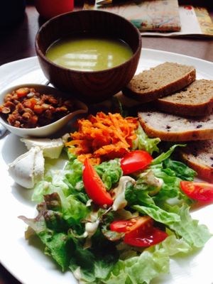 Vegetable soup, salad, pickled carrots, curried lentils and vegan cheese served with toasted bread at Organic House Salute in Kyoto