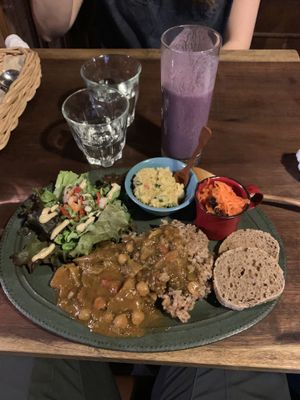 The veg curry with rice with a blueberry banana smoothie. at Organic House Salute in Kyoto