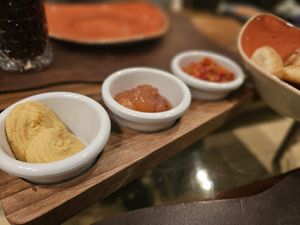 Hummus, sweet apple and sour pepper dips at Mirage Restoran in Kraljevo