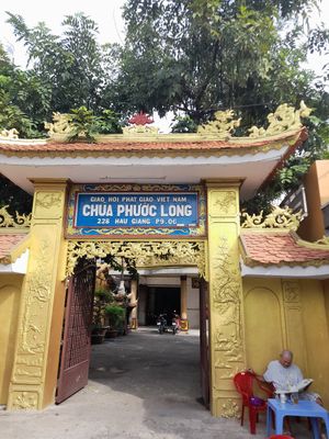 The pretty pagoda is next to the restaurant at An Dong in Ho Chi Minh City