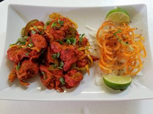 Vegan Chik'n Tikka: Soy-Wheat gluten chunks cooked with Cashew sour cream and tikka spices, eat as a Bowl or Naanwich at Bombay Food Junkies in St Louis