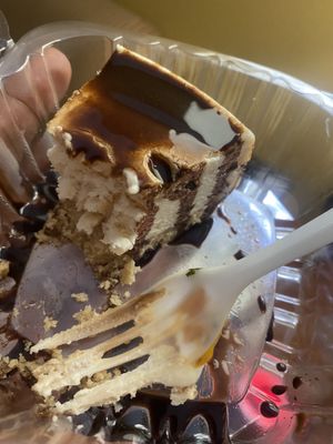 Vegan cheesecake with chocolate drizzle  at Bombay Food Junkies in St Louis