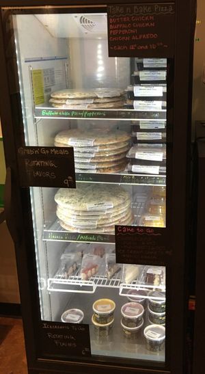 Frozen items for sale. Take n' Bake Pizza, Grab n' Go meals, cheesecake, ice cream. at Bombay Food Junkies in St Louis