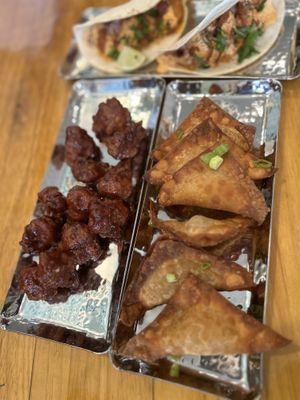 Crab Rangoon’s chicken wings, and shrimp tacos  at Bombay Food Junkies in St Louis