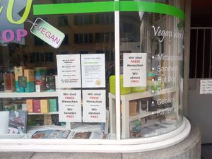 Posters downplaying covid-19 at Tofulino in Winterthur