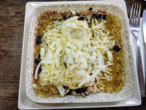 Enchilada con salsa verde at La Chaparrita in Sevilla