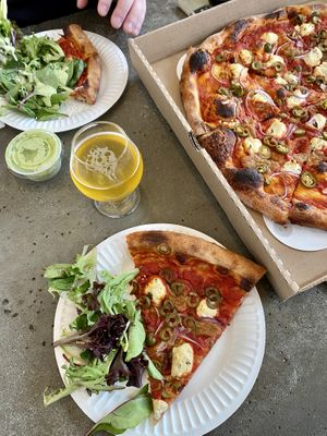 Pizza with tofu ricotta & beer from holy mountain next door   at Dantini Pizza in Seattle
