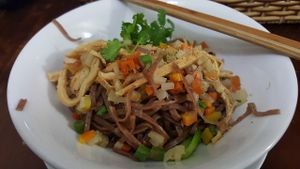 Hu Tieu Khó (35k) brown rice noodle and vegetables served with soup on the side.  at Khai Minh 2 in Ho Chi Minh City