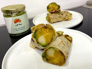 aloo tikki kathi rolls (plated at home) at Spice Waala - Rainier Ave in Seattle