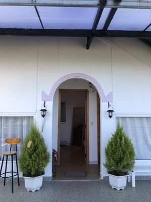 The entrance to our room and another guest room upstairs  at Dalat Harmony Garden in Da Lat